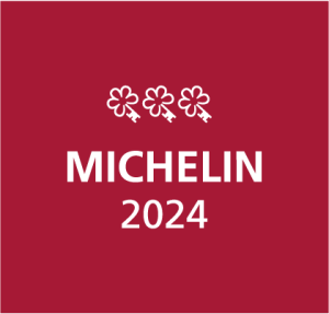 Michelin Keys' official logo in a red square with white Michelin 2024 text and 3 keys awarded to Hotel Sacher.